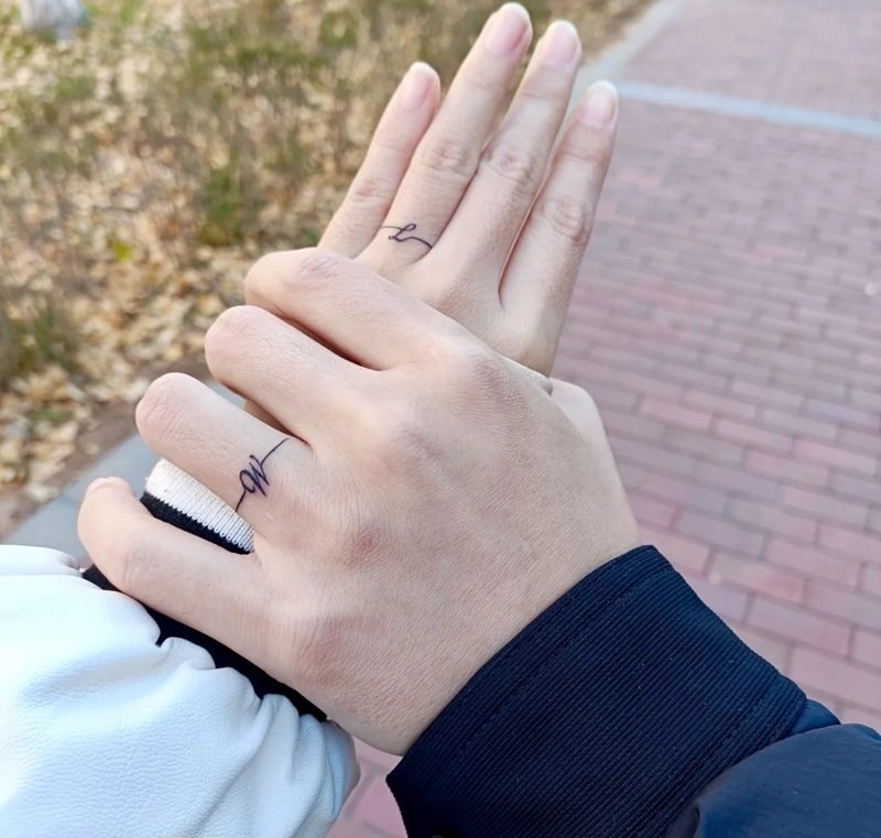 couple hình xăm đôi