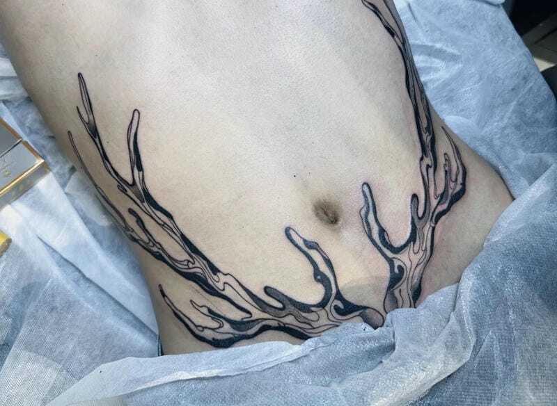 Ảnh tattoo full bụng nam với đầu lâu cực ngầu cá tính