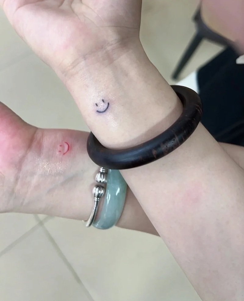 hình xăm mặt cười 19