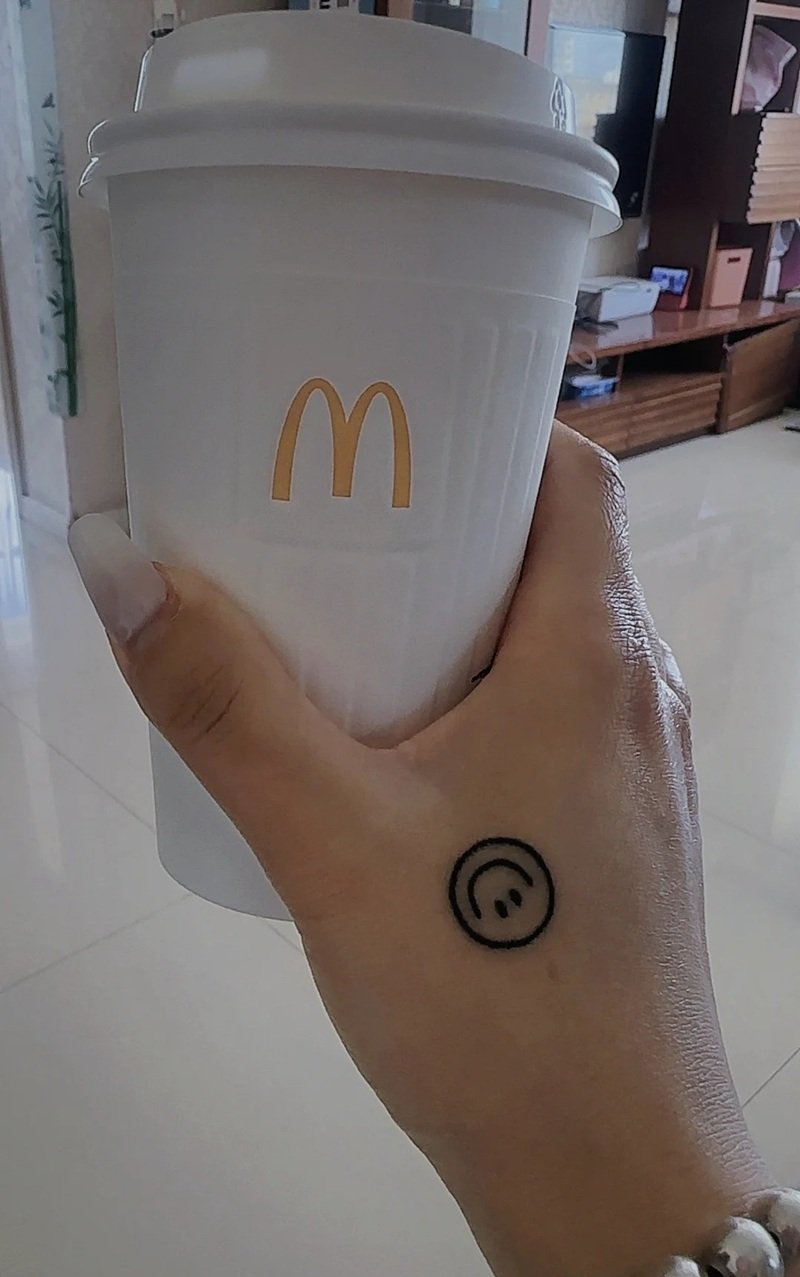 hình xăm mặt cười 9