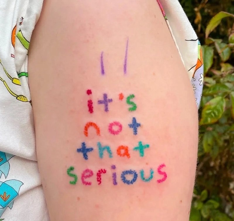 xăm chữ bắp tay nữ 21